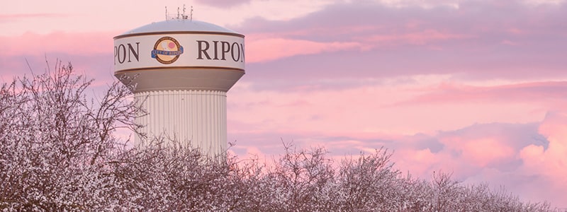 Ripon water tower with a sunset background